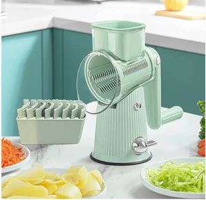 Multi-functional vegetable cutter with hand-operated rocker-style cutting mechanism